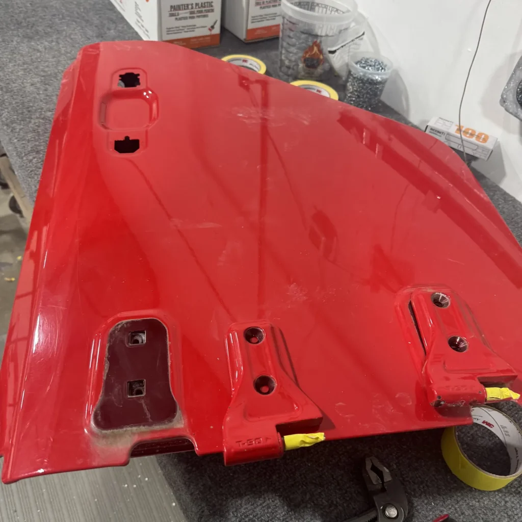 Red powder-coated fender